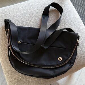 Lululemon athletica Black Crossbody Bag with Gold Accents